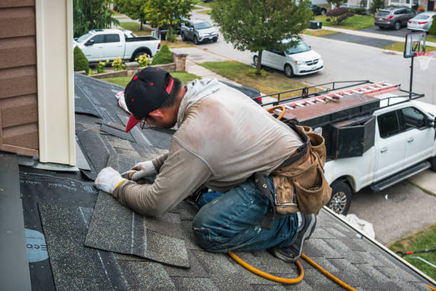 Professional Roofing technician working in Gilbertville, MA